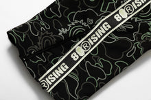 【 BAPE X 88RISING 】GLOW IN THE DARK CAMO TRACK PANTS