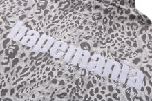 WILD LEOPARD PATTERN RELAXED FIT HALF ZIP SWEATSHIRT