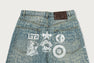 MULTI LOGO DENIM FLARED PANTS