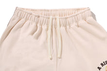 A RISING BAPE RELAXED FIT SWEAT PANTS