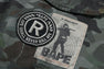 HYBRID CAMO MULTI BADGE CARGO PANTS