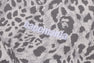 WILD LEOPARD PATTERN RELAXED FIT HALF ZIP SWEATSHIRT