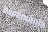WILD LEOPARD PATTERN RELAXED FIT HALF ZIP SWEATSHIRT