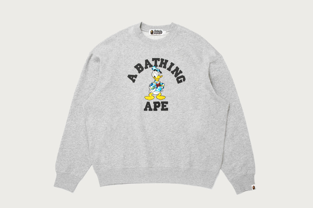 BAPE X DISNEY 】DONALD DUCK COLLEGE RELAXED FIT CREWNECK | bape.com BAPE X DISNEY 】DONALD DUCK COLLEGE RELAXED FIT CREWNECK | bape.com