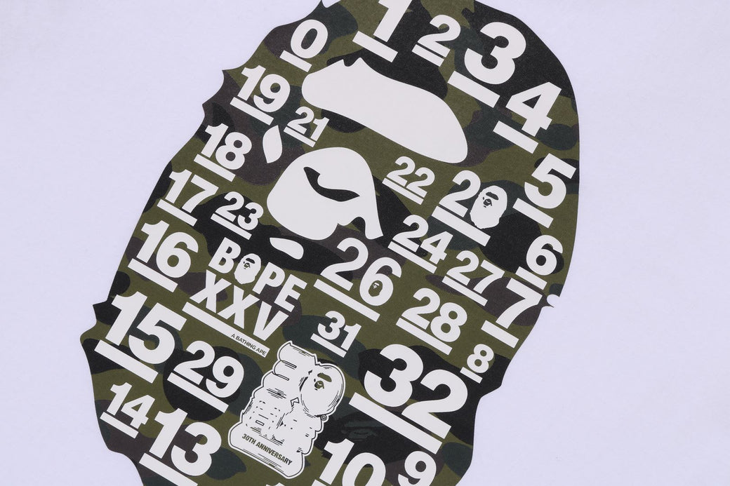 A BATHING APE 32ND ANNIV. 1ST CAMO BIG APE HEAD TEE | bape.com