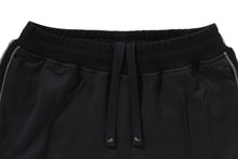 TRACK PANTS