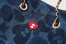 APEE LINE CAMO DENIM DRAWSTRING MINI BAG