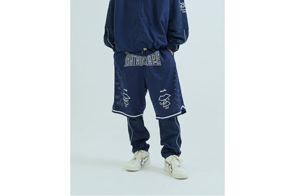 LAYERED TRACK PANTS