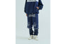 LAYERED TRACK PANTS