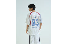 APA FRAME PATTERN MULTI LOGO RELAXED FIT FOOTBALL JERSEY